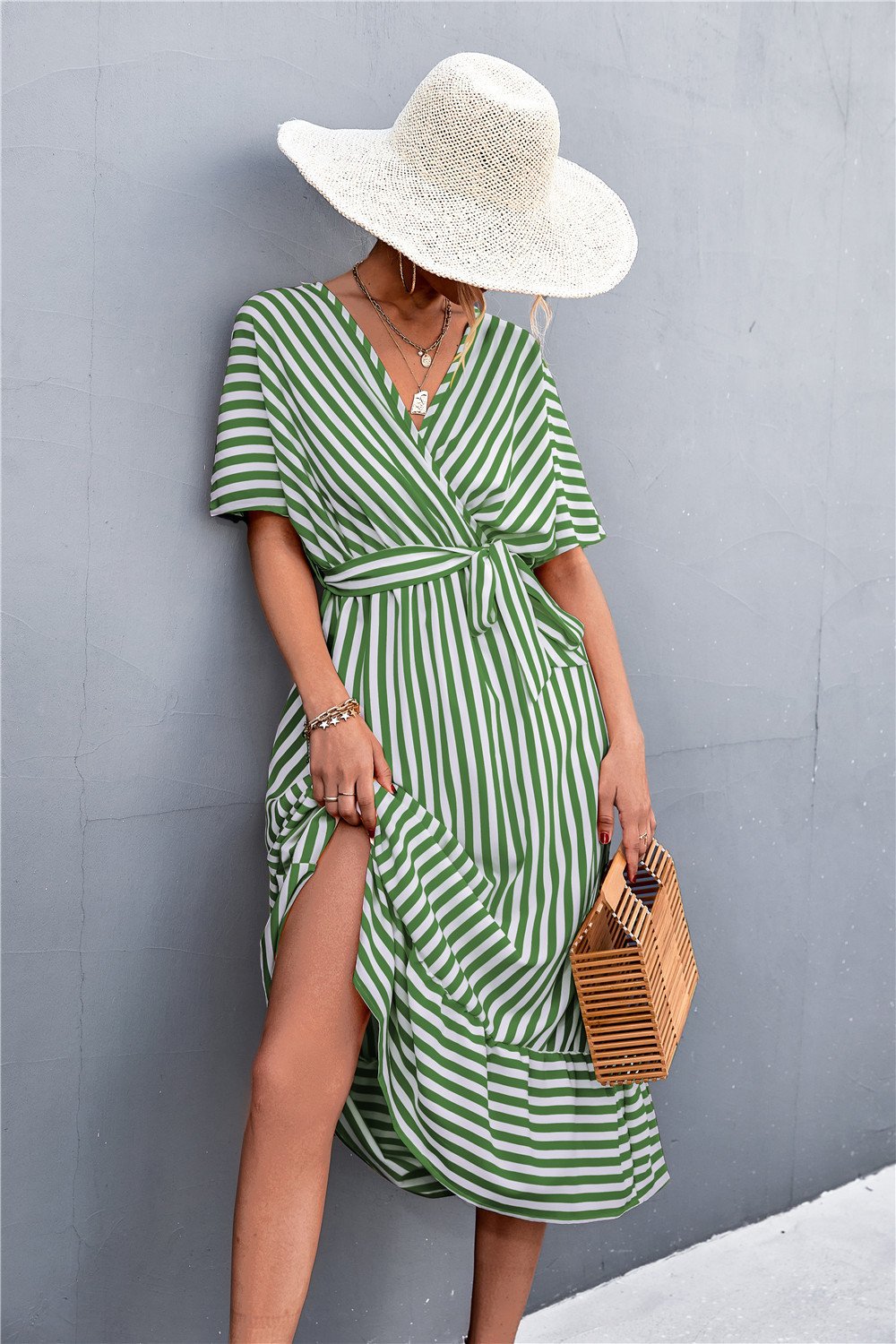 0f8bf962-8c51-4378-82c9-fa94ebc8cc0d.jpg European And American Spring And Summer Cross V-neck Lace-up Striped Dress - Image 1